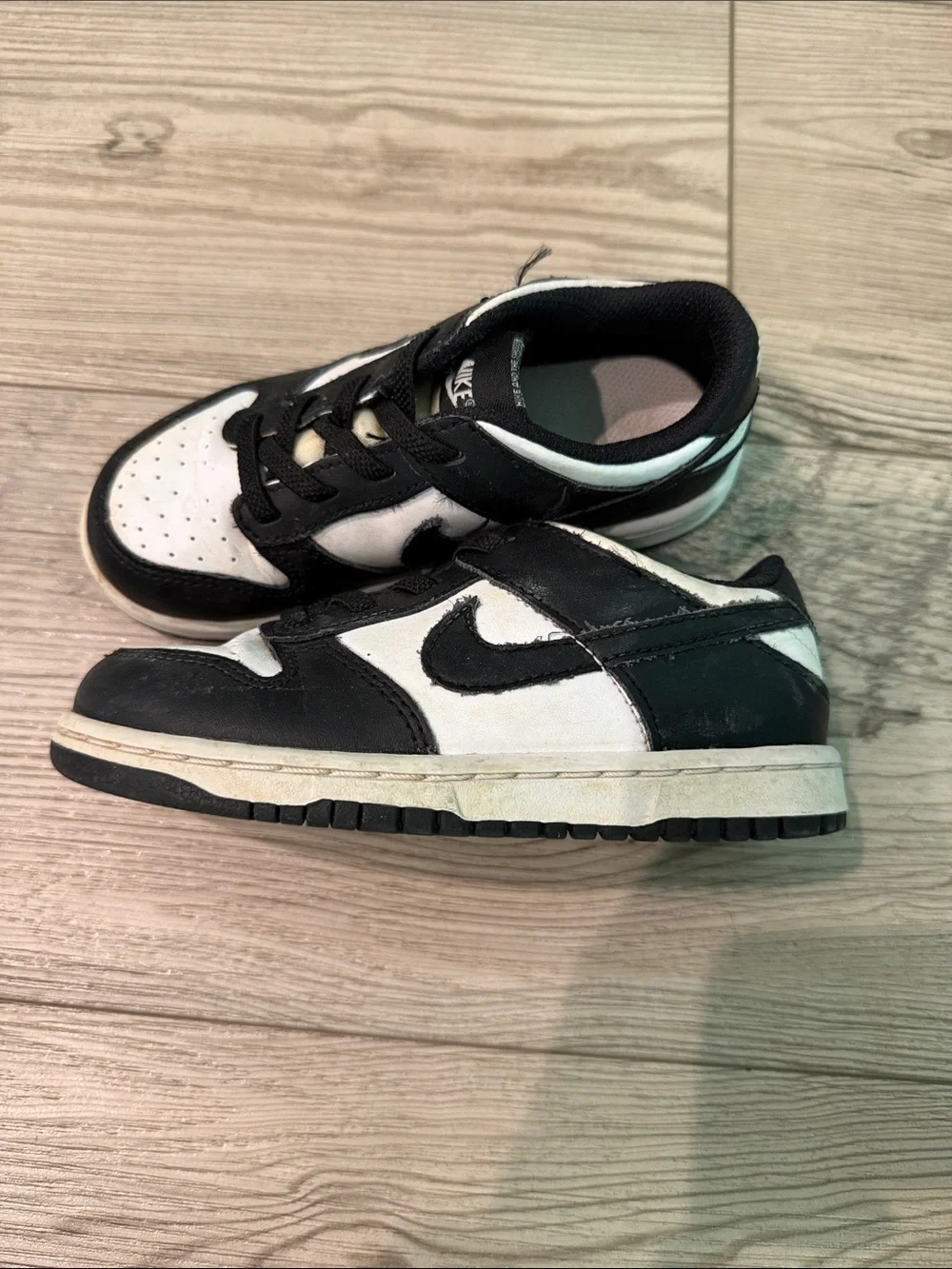 Nike Kids Black and White Low-Top Sneakers with Swoosh